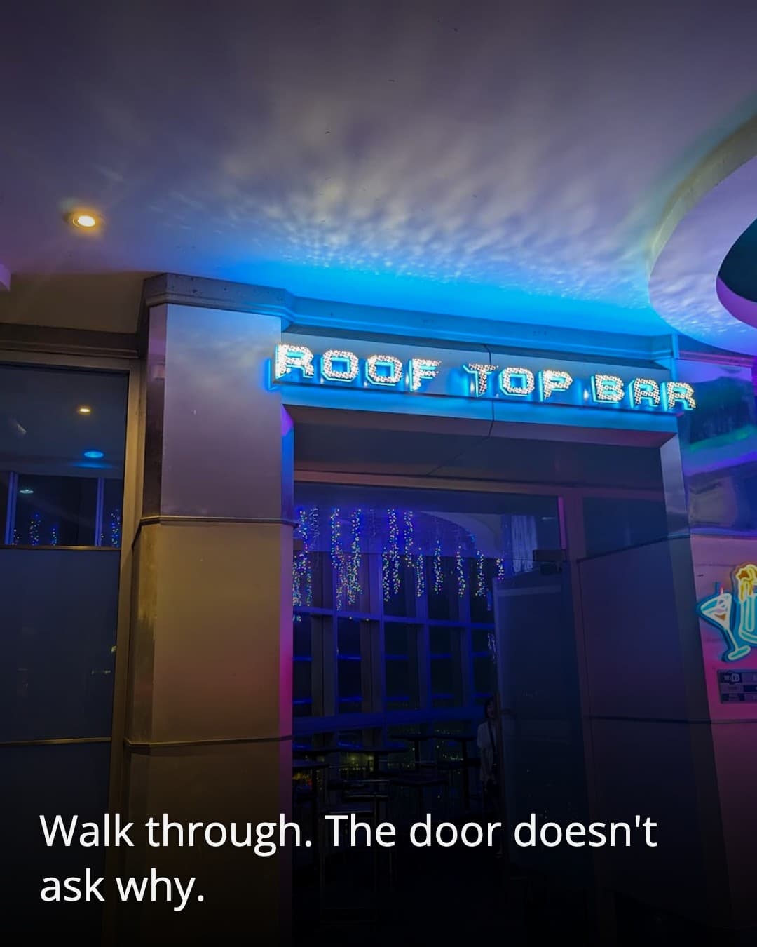 The Roof Top Bar, entrance sign