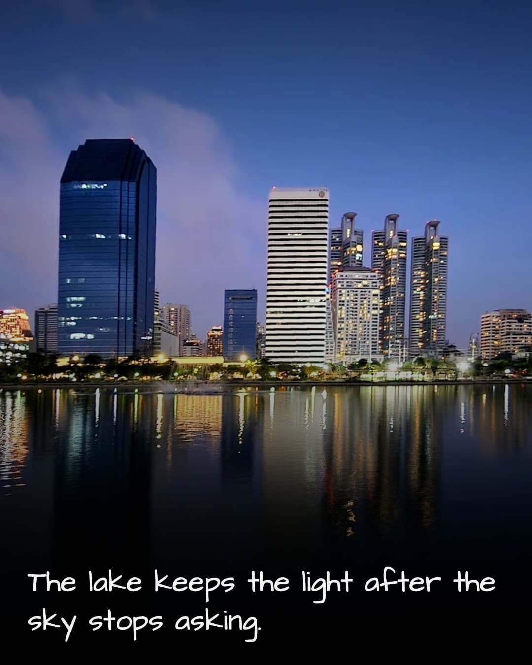 Benjakitti Park lake at night
