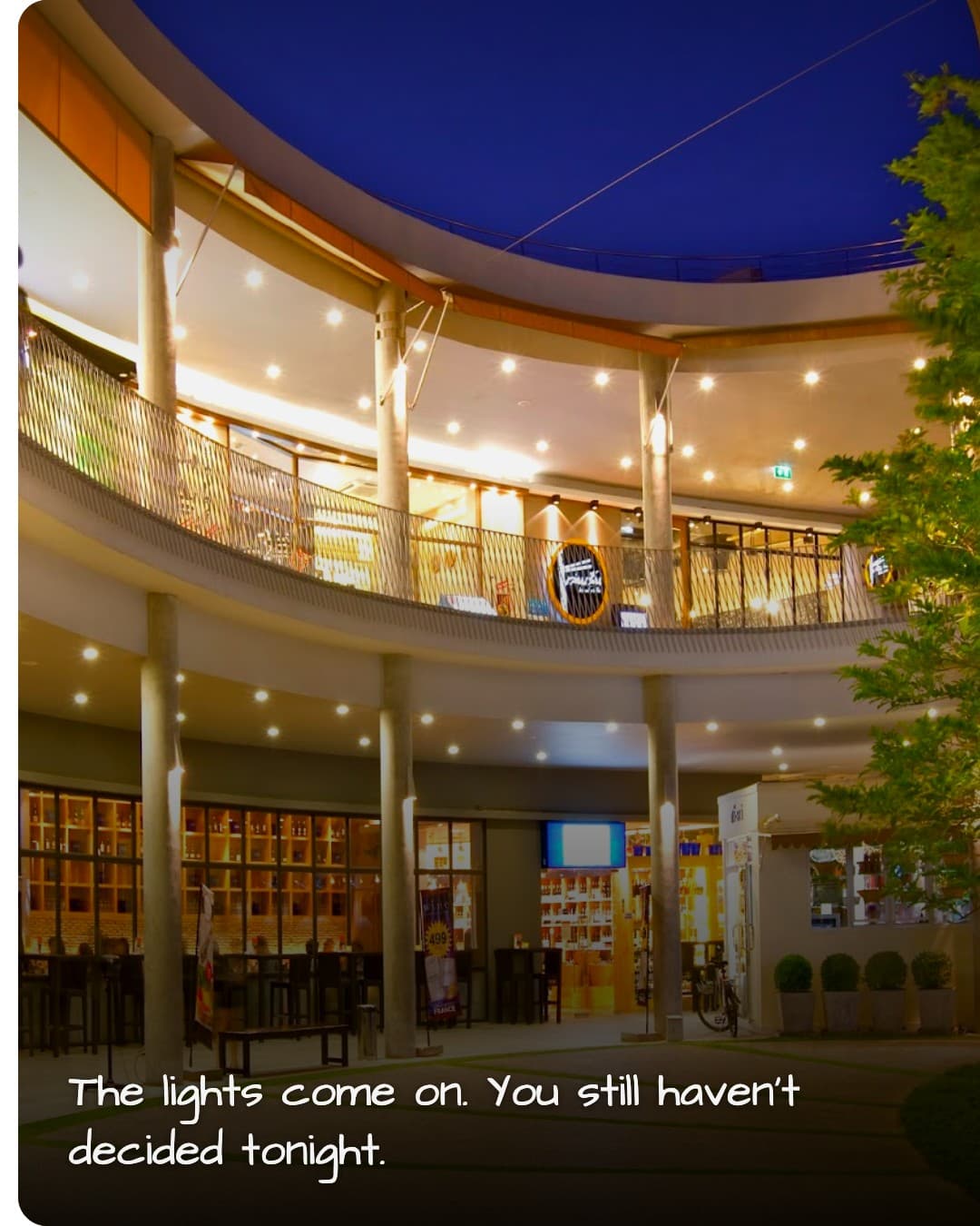 K Village atrium at dusk